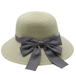 Summer straw sun hat for women with large brim and black and white plaid bow decoration