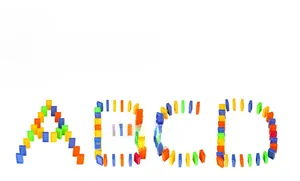 Bunte Domino-Bausteine als Buchstaben ABCD geformt für frühkindliches kreatives Lernen