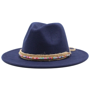 Detail of navy blue fedora featuring decorative hemp rope, rhinestones and colorful beads