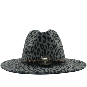 Gray leopard print wool fedora with brown leather band and silver bull skull accent