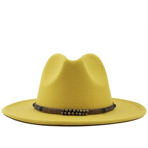 Classic ginger wool fedora hat with a studded brown leather band and a flat brim