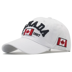 Close-up of 3D CANADA embroidery and national flag patch on white cotton baseball cap