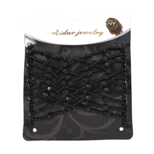 Black beaded magic hair comb displayed on original packaging for styling hair