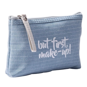 Blue canvas makeup bag with white text print and sturdy metal zipper on white background