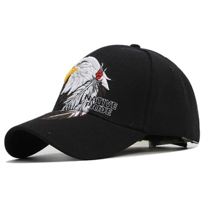 Close-up of bald eagle head embroidery with Native Pride text on black cotton baseball cap