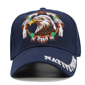 Close-up of eagle head embroidery and Native Pride lettering on dark blue baseball cap