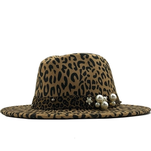 Leopard print wide brim fedora hat with pearls and floral accent on white background