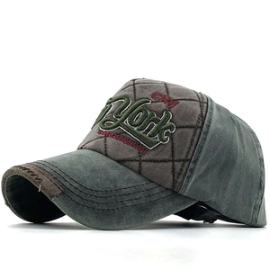 Vintage washed cotton baseball cap with New York embroidery and distressed brim detail