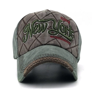 Detail of vintage washed baseball cap featuring contrast colors and City New York embroidery