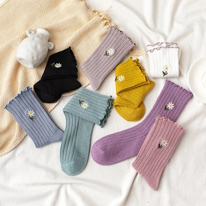 Japanese style lace-edged crew socks with cute daisy embroidery in seven assorted colors