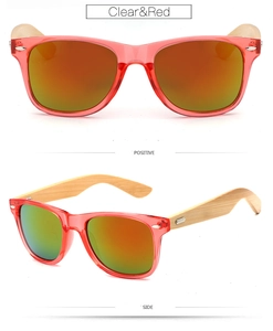 Detail view of red transparent sunglasses with natural bamboo temples and colorful lenses