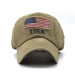Close-up of USA letter and American flag embroidery on khaki washed cotton baseball cap