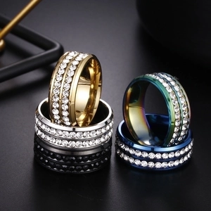 Detail shot of multi-color titanium steel rings with double-row zircon pavé settings