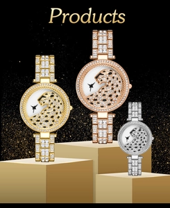 Detailed luxury watch set in gold rose gold and silver with crystal leopard head dial