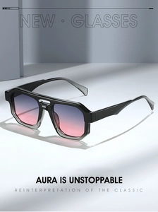 Detail view of irregular geometric aviator sunglasses with gradient pink lenses and dual beam