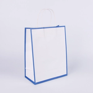 Detailed view of white vertical shopping paper bag with elegant blue edge trim and twisted rope handle