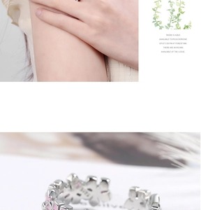 Detailed close-up of 925 sterling silver flower ring with pink enamel and S925 hallmark