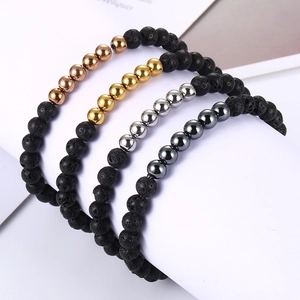 Set of four black lava stone bead bracelets with gold, silver, rose gold and gray accents