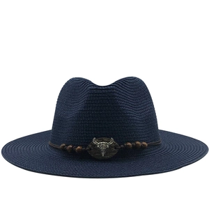 Dark blue woven straw cowboy fedora hat with silver bull skull and beaded band ornament
