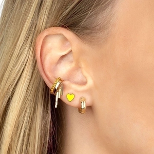 Gold-plated ear jewelry set with yellow heart stud, bamboo hoop, and dangling metal ear cuff