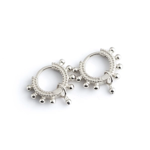 Elegant s925 silver hoop earrings with metallic beads and teardrop pendants on white background