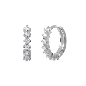 Detail shot of silver hoop earrings featuring five round-cut micro-paved zircons