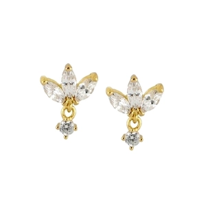 Close-up of gold-plated clover earrings with clear zircon stones on a white background