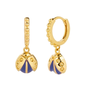Golden ladybug hoop earrings with dark blue enamel detail on a clean white background