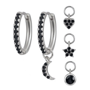 Detail of S925 silver earring set with black stones and moon star heart charms