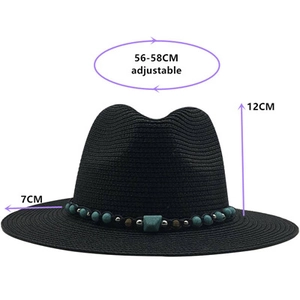 Detail of black wide-brim straw hat with dimensions 12cm crown height and 7cm brim