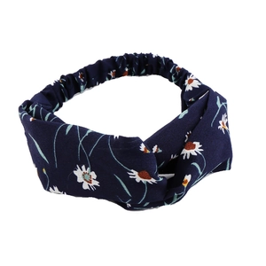 Daisy print chiffon headband in navy blue featuring a stylish front twist knot design