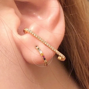 Gold C-shaped ear cuff with sparkling clear zircons and colorful multi-gemstone accents