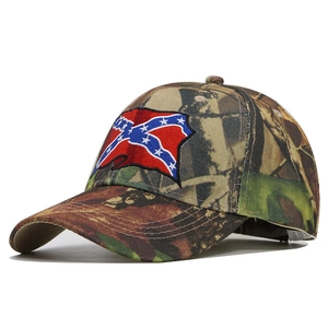 Detail of camouflage baseball cap featuring a skull embroidery and stitched brim