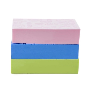Three-pack soft bath sponges in pink, blue, and green for gentle body cleaning