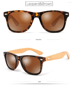 Detailed view of leopard print sunglasses with brown lenses and bamboo temples