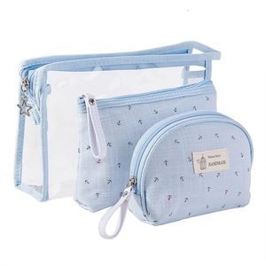 Set of 3 blue travel cosmetic bags with clear PVC and nautical anchor patterns