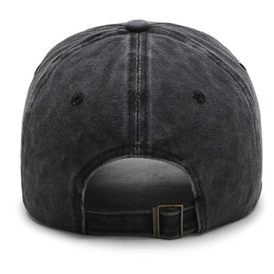 Close-up of the washed cotton baseball cap back with adjustable metal buckle and stitching