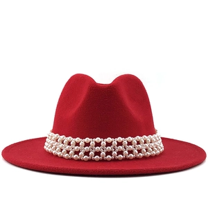 Luxury red wool fedora hat with wide flat brim and elegant pearl band decoration