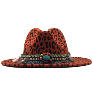 Orange leopard print wide brim wool fedora with bohemian beadwork and turquoise stone