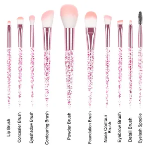 11-piece pink glitter handle makeup brush set with gradient bristles and rose gold ferrule