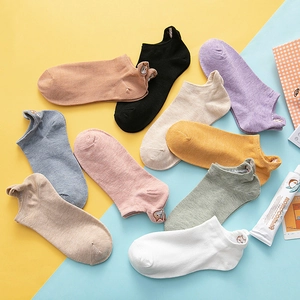 Colorful low-cut cotton ankle socks with cute animal embroidery on a dual-tone background