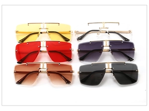 Collection of oversized rimless square sunglasses in multiple vibrant gradient colors