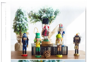 Detailed view of six 13cm wooden nutcracker ornaments for Christmas tree decoration