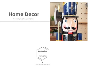 Close-up of resin nutcracker soldier figurine with detailed blue and red uniform painting
