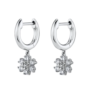 Sparkling S925 silver needle snowflake flower earrings with zircon in a symmetrical view