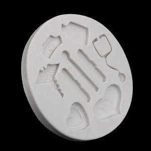 White silicone medical mold with stethoscope and nurse hat designs for cake decorating
