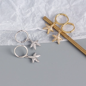 Starfish drop earrings in gold and silver finish with sparkling crystal embellishments