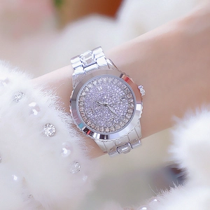 Luxury silver ladies quartz watch with full diamond dial and zircon bezel on white fur