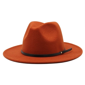 Classic caramel orange wide brim fedora hat with elegant black band and gold rivet detail