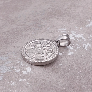 Polished silver titanium steel round tree of life pendant with detailed relief carving